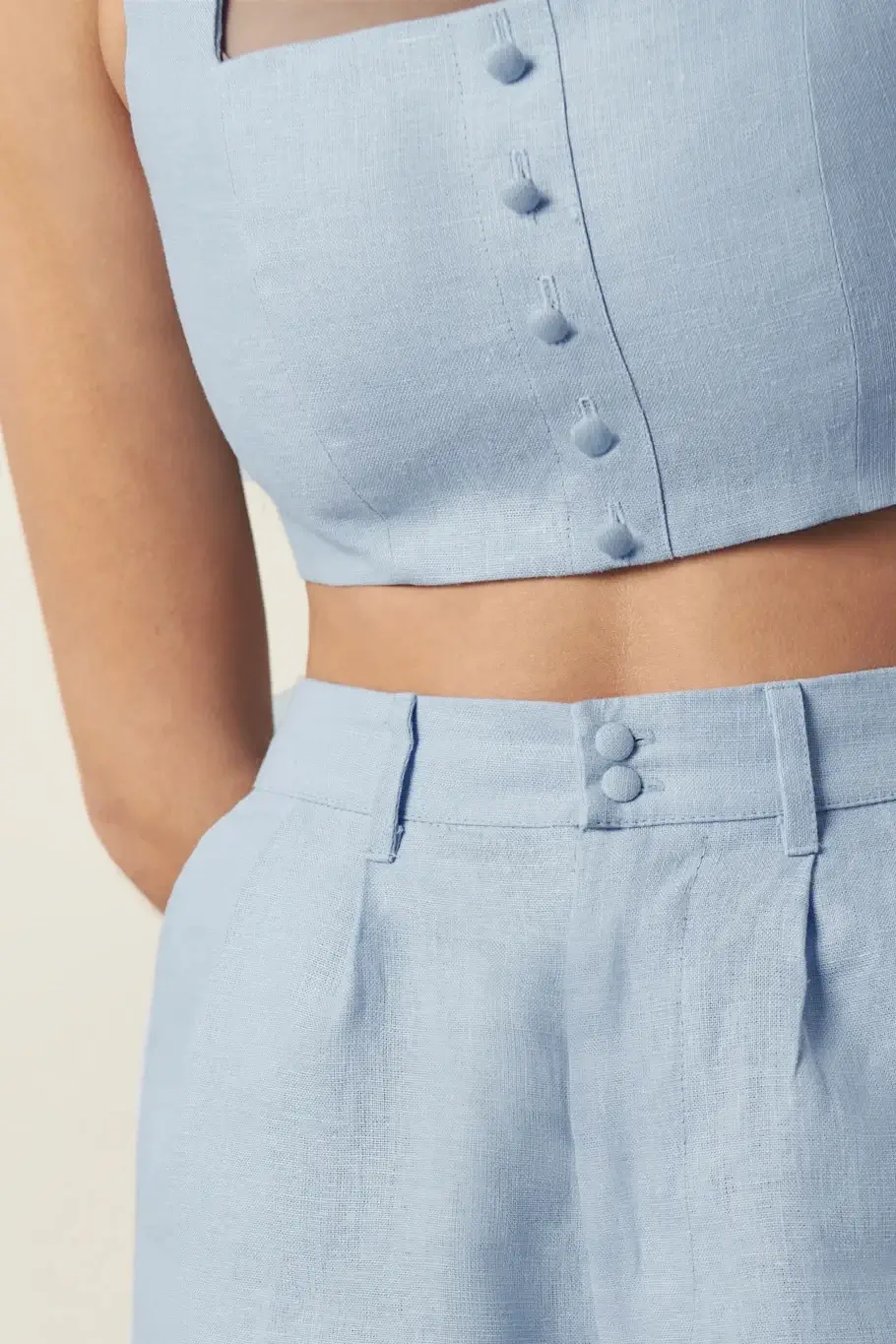 Blue Linen Crop Top 4 Close-up of blue linen crop top showing covered button detail.