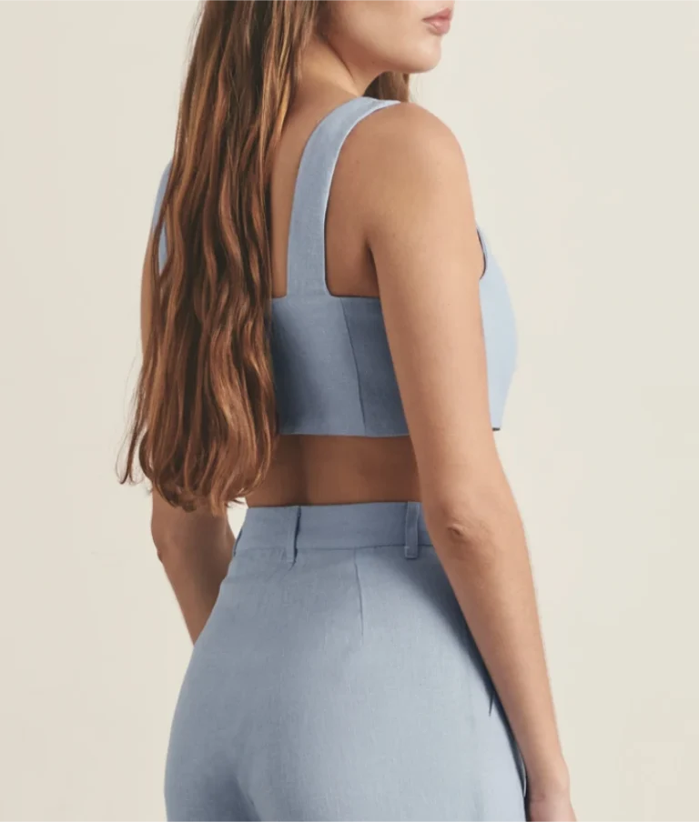 Blue linen crop top with recycled zip fastening at back.