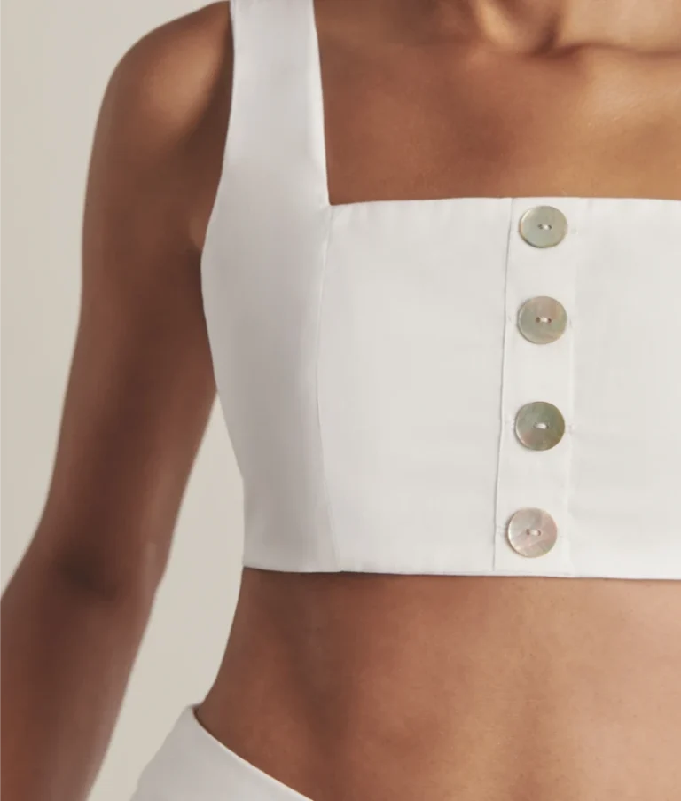 White organic cotton crop top with panelled construction to minimise fabric waste.