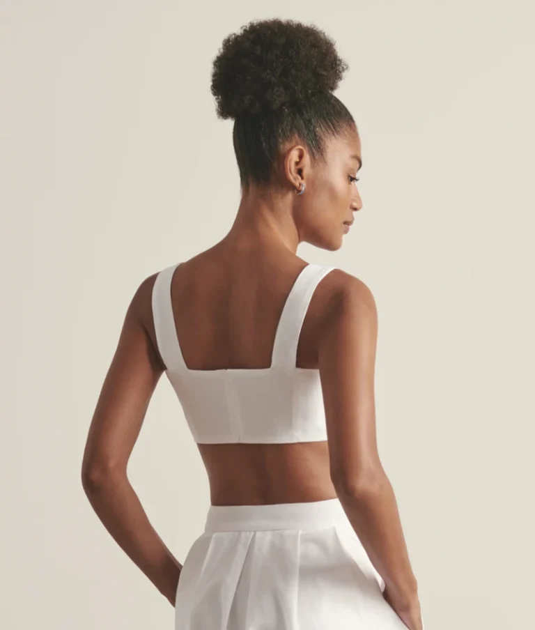 White organic cotton crop top with recycled zip fastening at back.